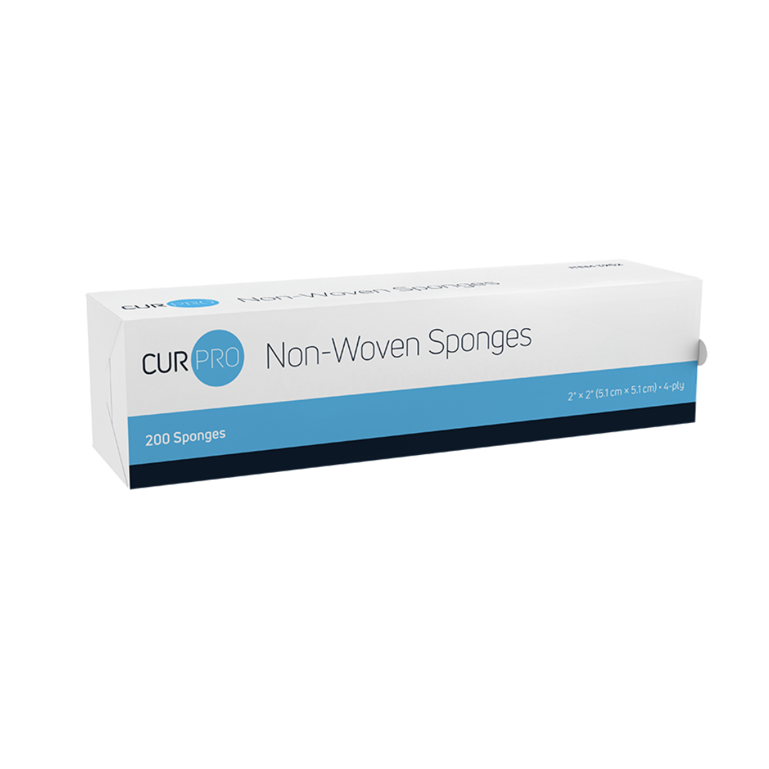 A rectangular white and blue box labeled Dynarex CurPro Non-Woven Sponges contains 200 highly absorbent 2x2 inch (5.1cm x 5.1cm), 4-ply wound sponges, shown against a plain white background.